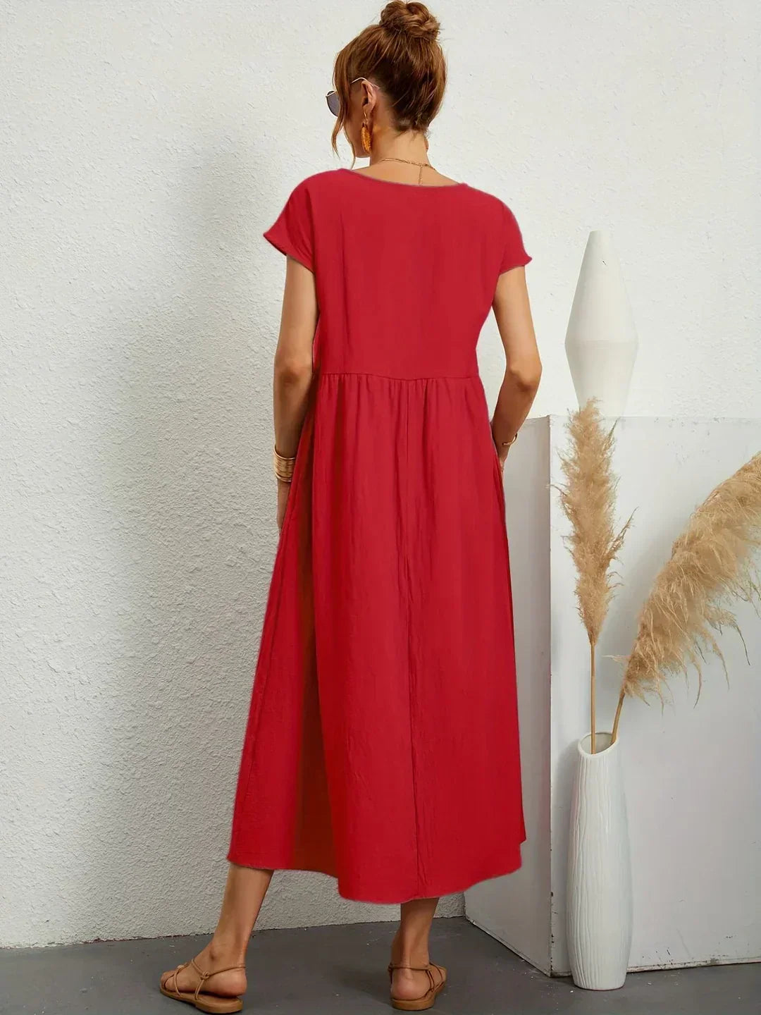 Abito midi fluido eleganza senza tempo