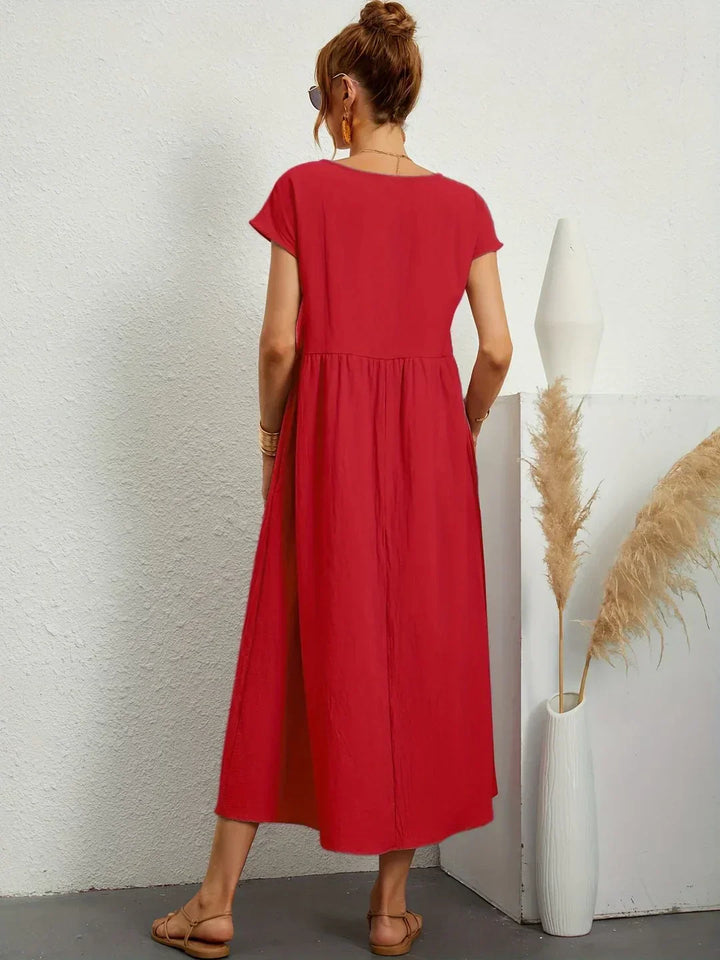 Abito midi fluido eleganza senza tempo