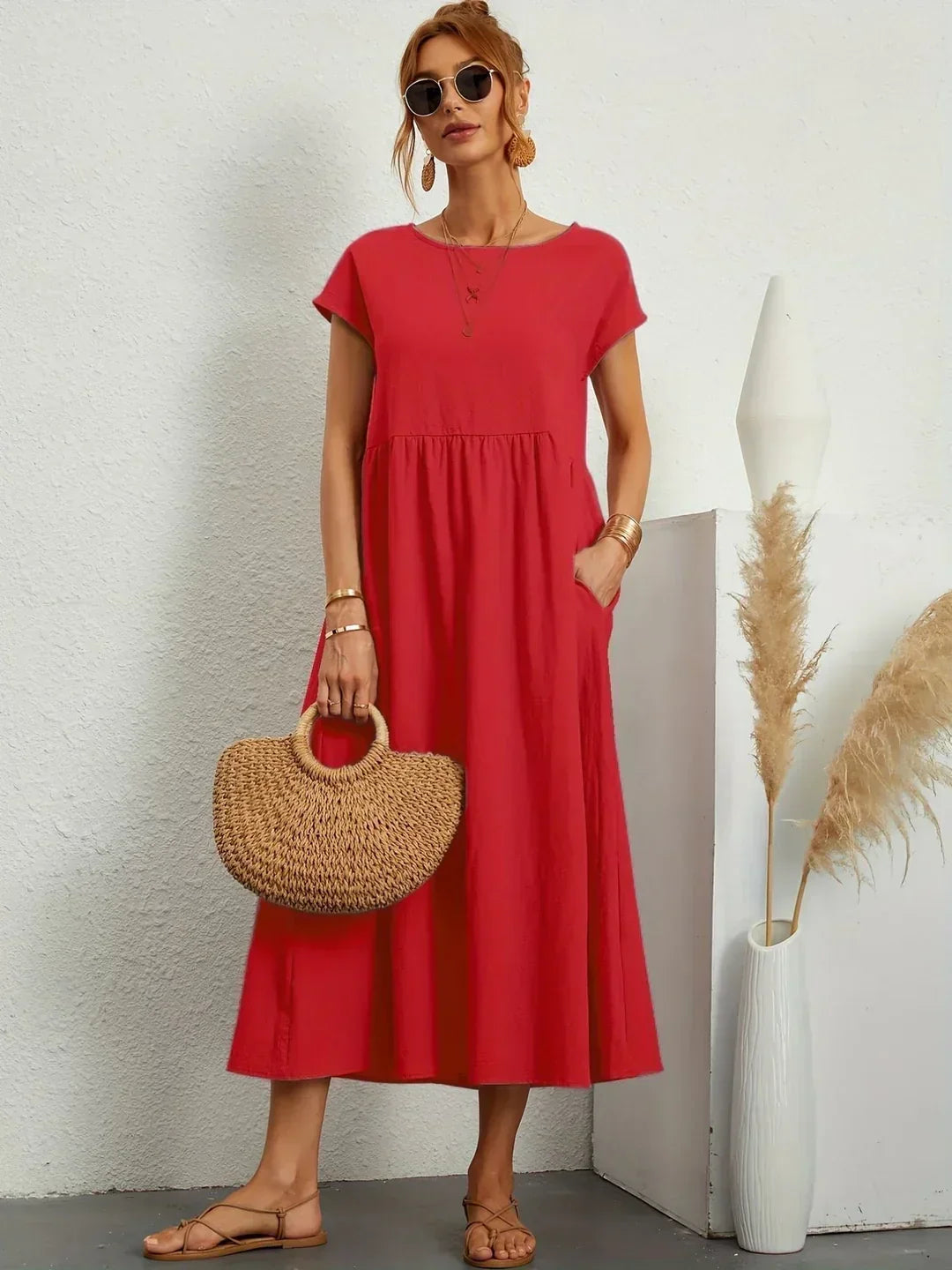 Abito midi fluido eleganza senza tempo