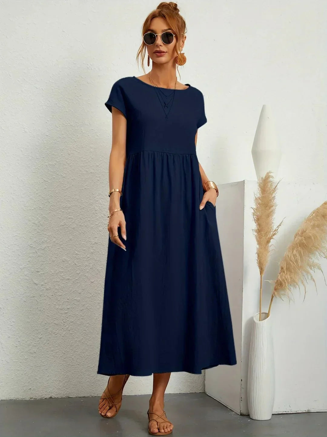 Abito midi fluido eleganza senza tempo