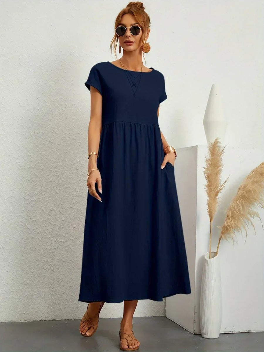 Abito midi fluido eleganza senza tempo