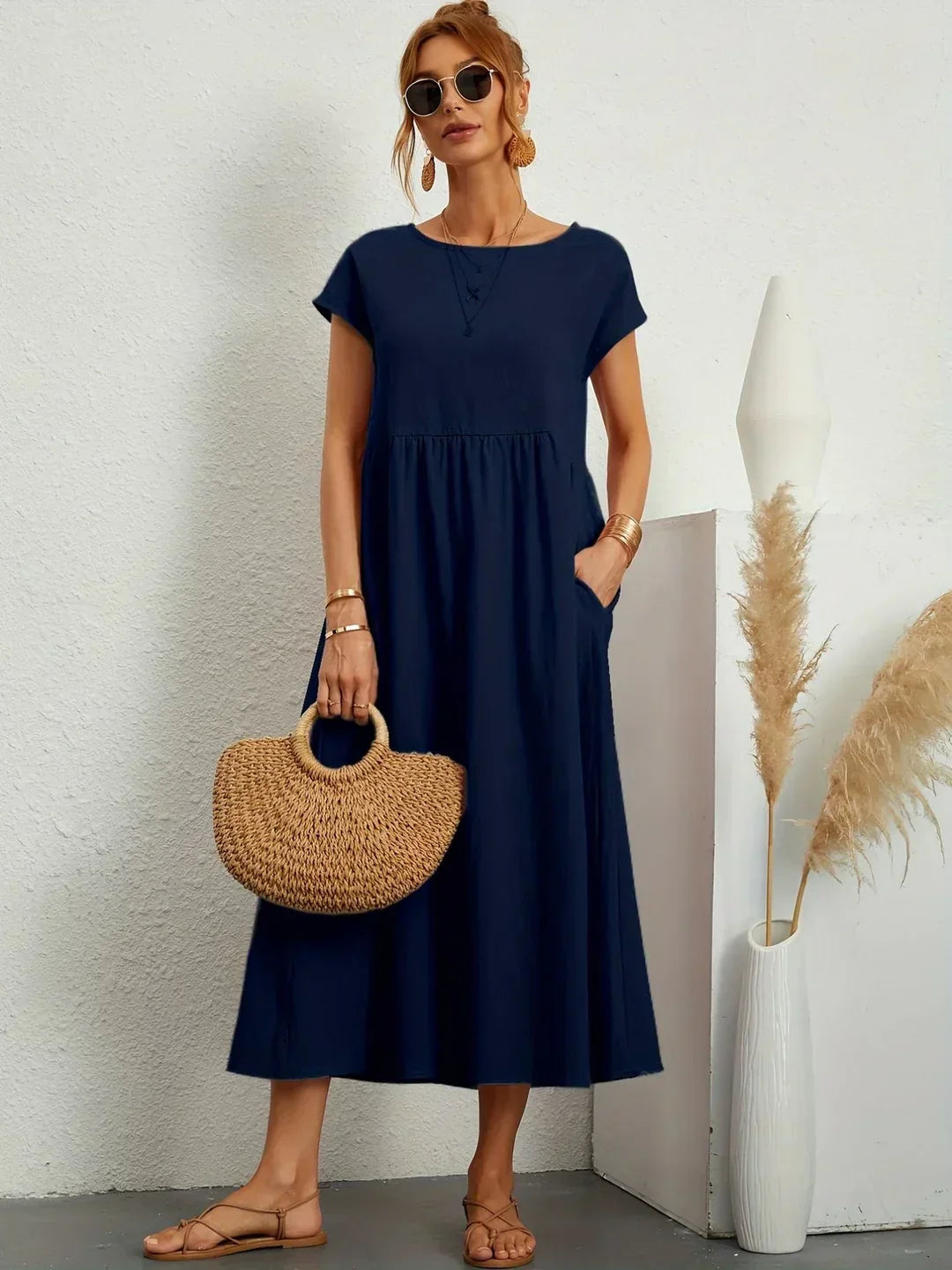 Abito midi fluido eleganza senza tempo