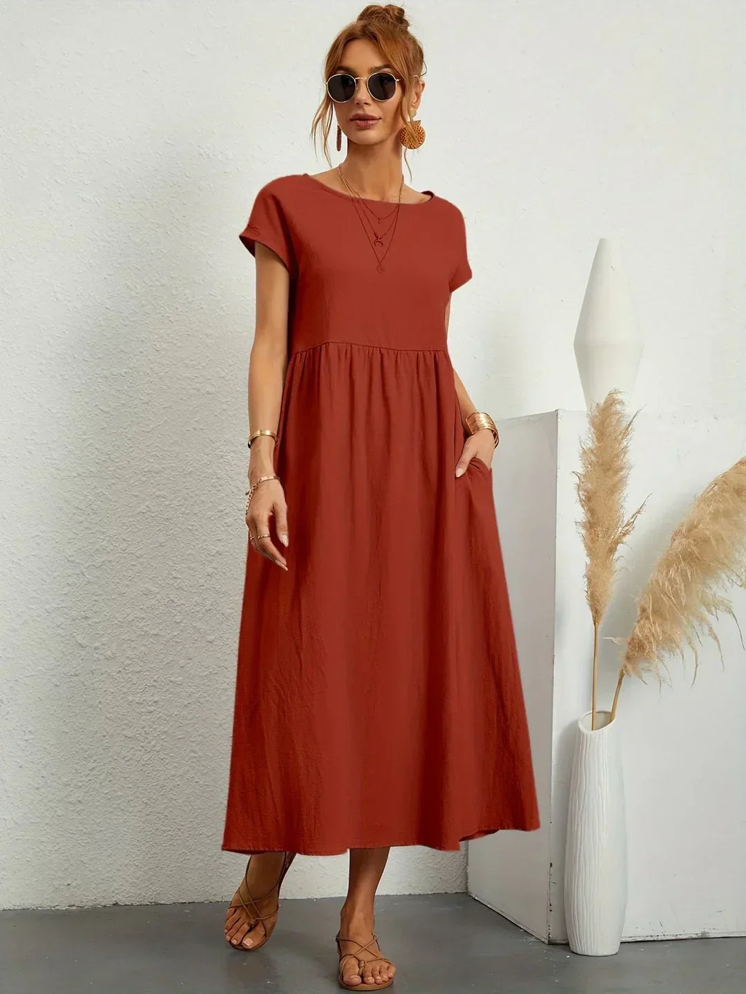 Abito midi fluido eleganza senza tempo