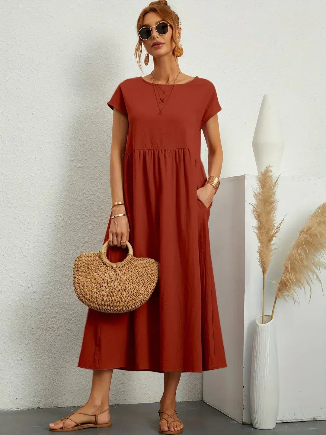 Abito midi fluido eleganza senza tempo