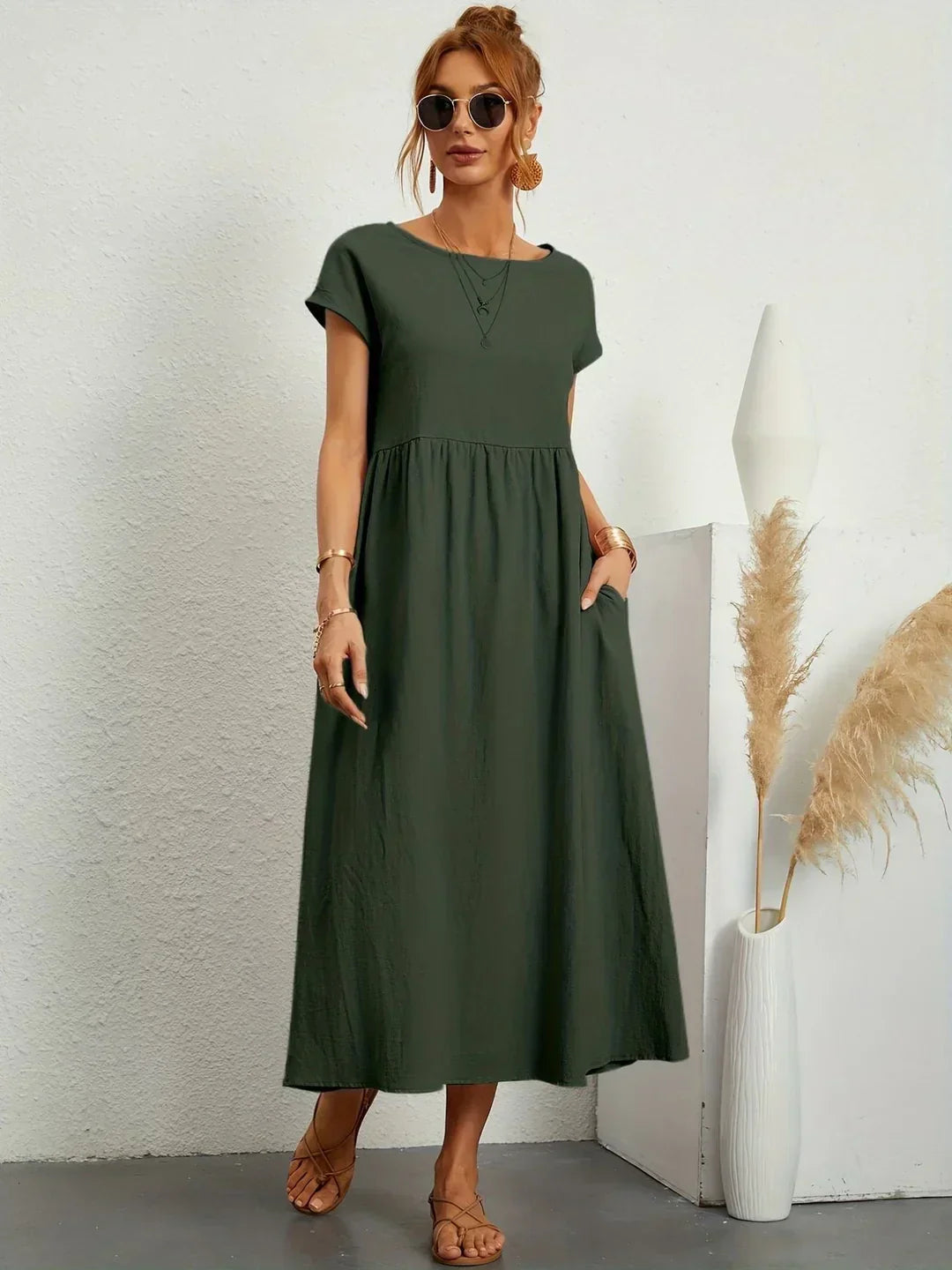 Abito midi fluido eleganza senza tempo