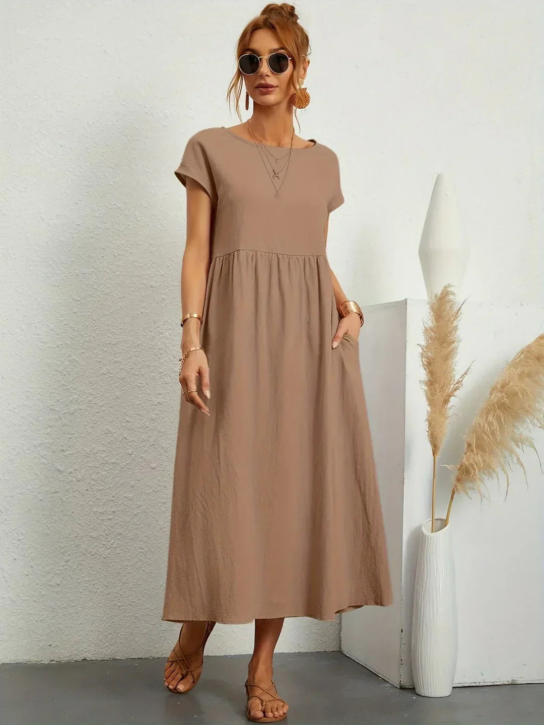 Abito midi fluido eleganza senza tempo