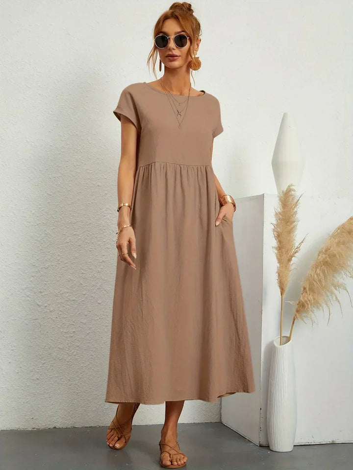 Abito midi fluido eleganza senza tempo