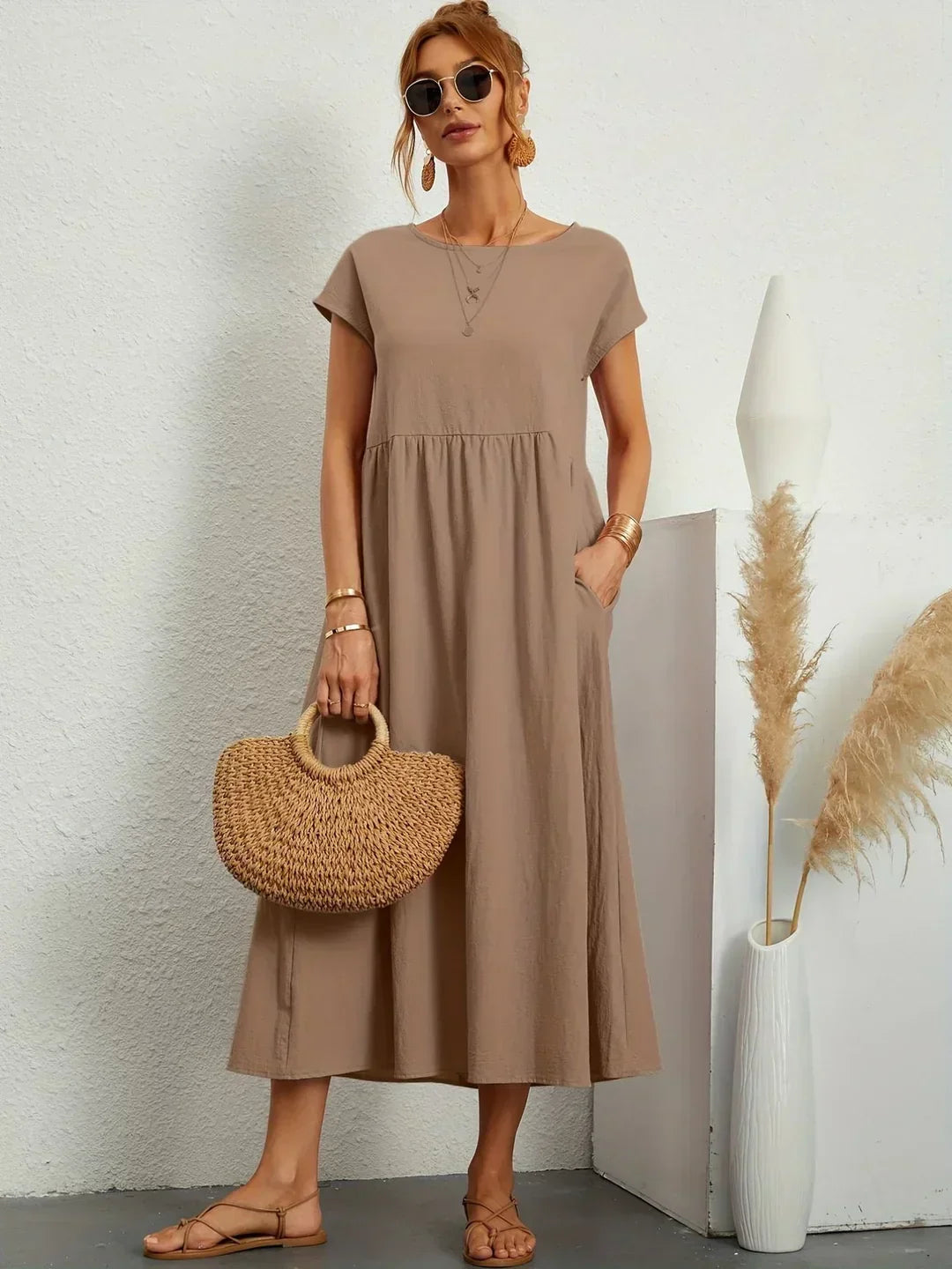 Abito midi fluido eleganza senza tempo