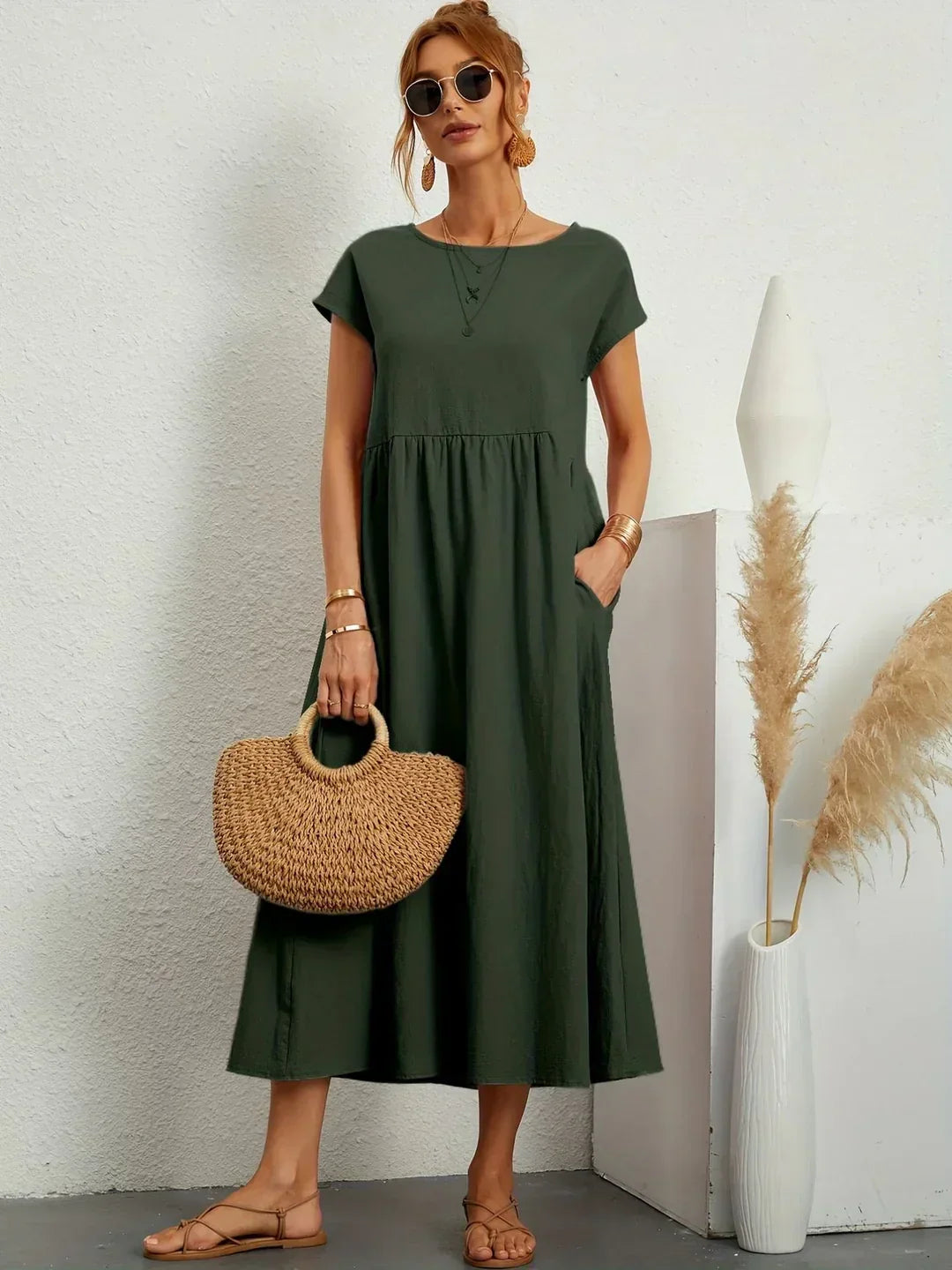 Abito midi fluido eleganza senza tempo