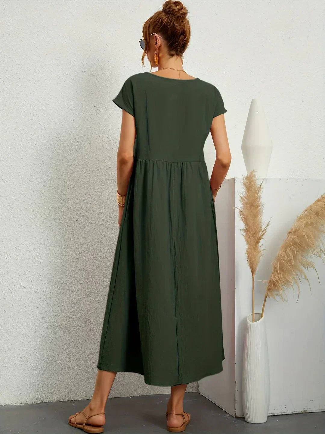 Abito midi fluido eleganza senza tempo