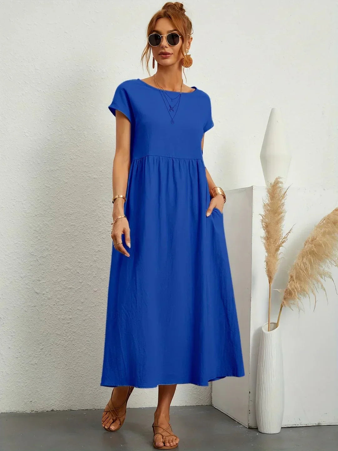 Abito midi fluido eleganza senza tempo