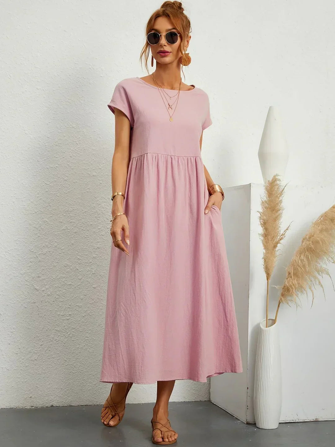 Abito midi fluido eleganza senza tempo