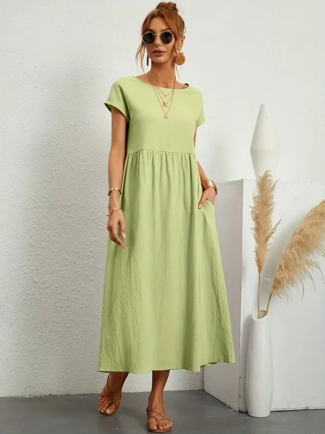 Abito midi fluido eleganza senza tempo