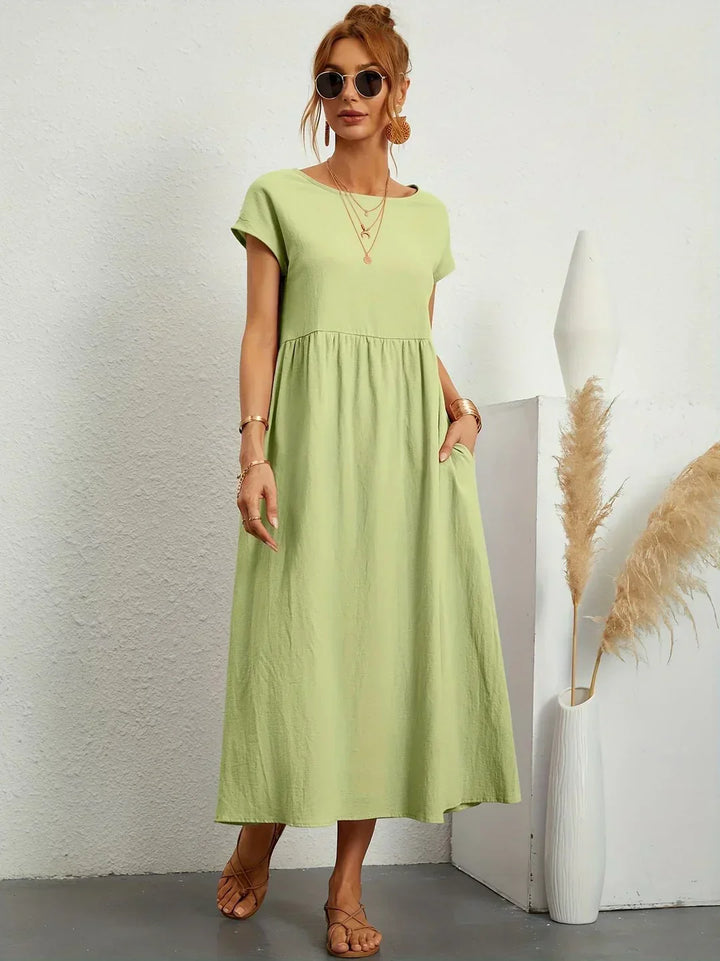 Abito midi fluido eleganza senza tempo