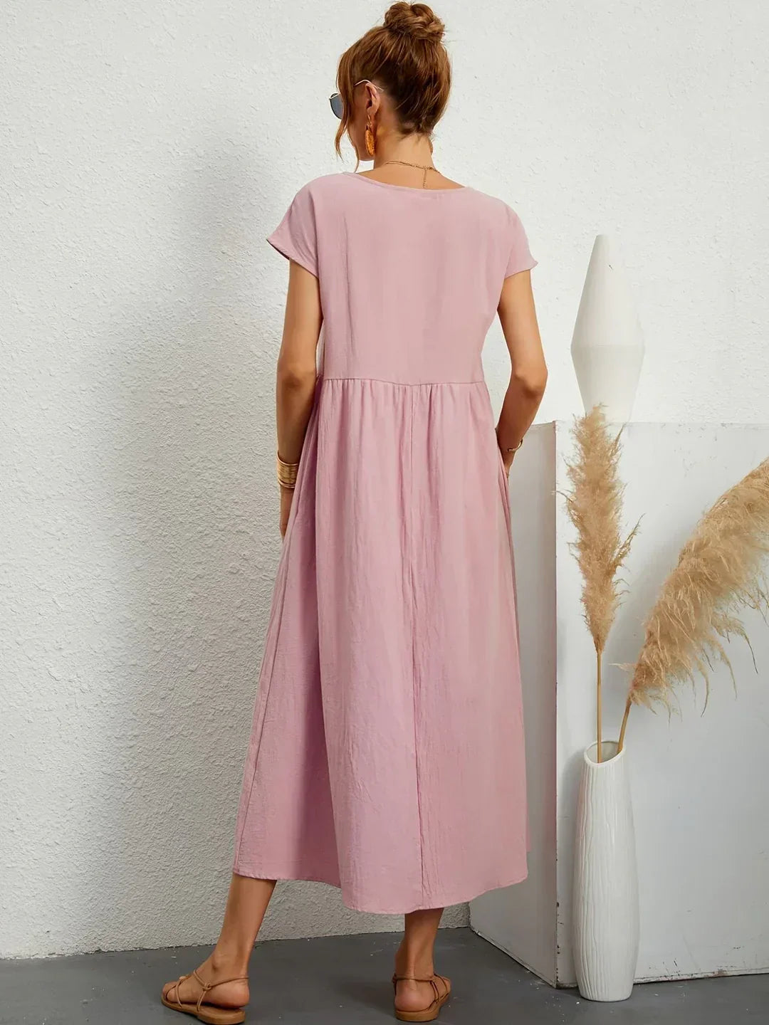 Abito midi fluido eleganza senza tempo