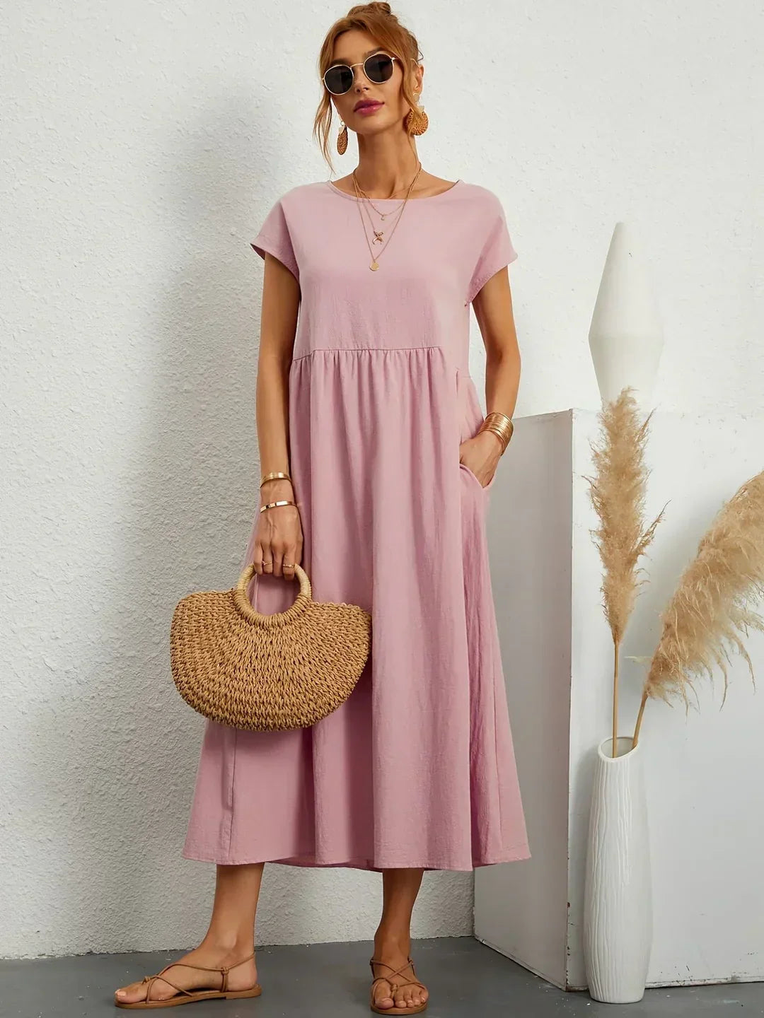 Abito midi fluido eleganza senza tempo