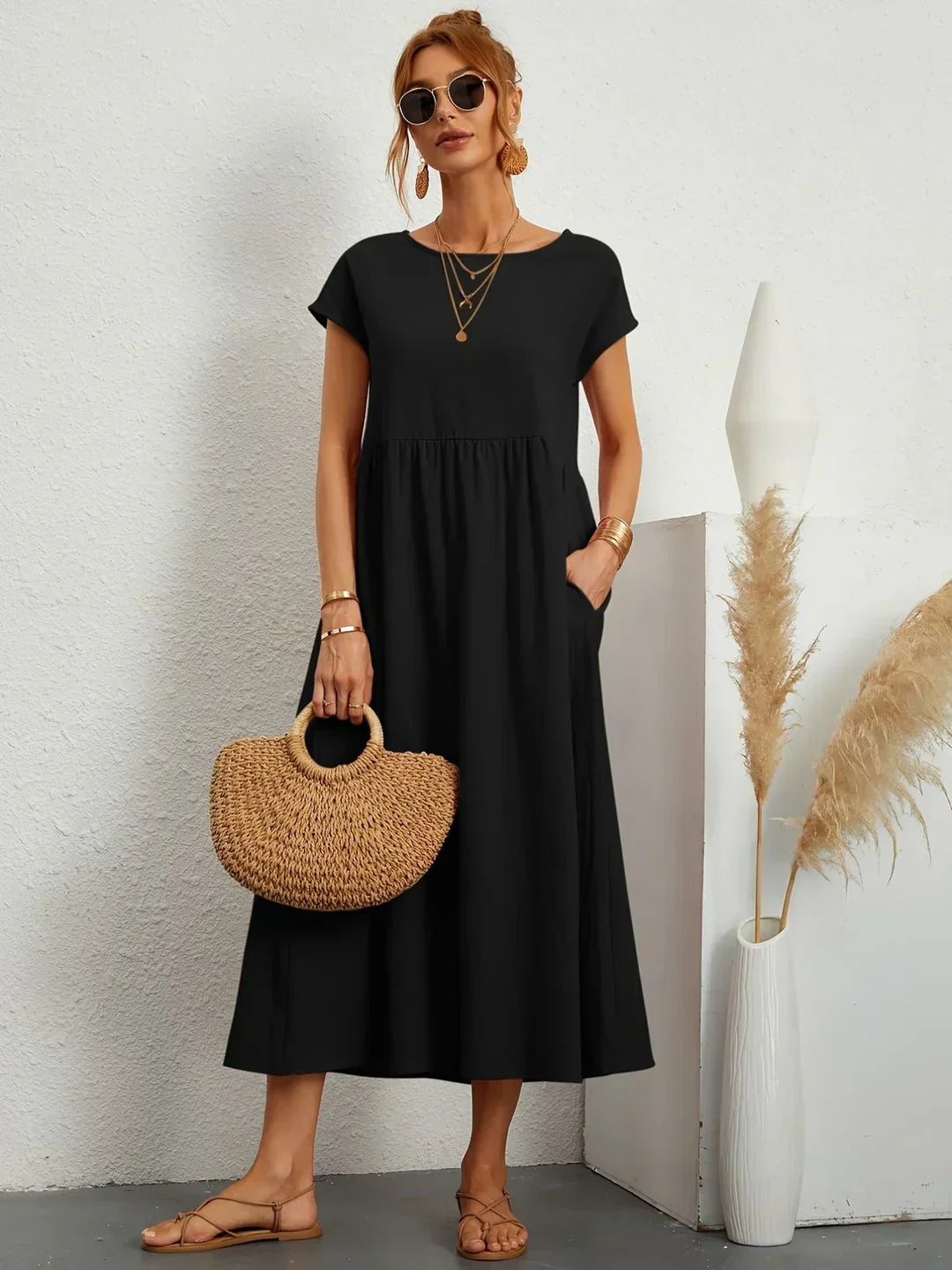 Abito midi fluido eleganza senza tempo