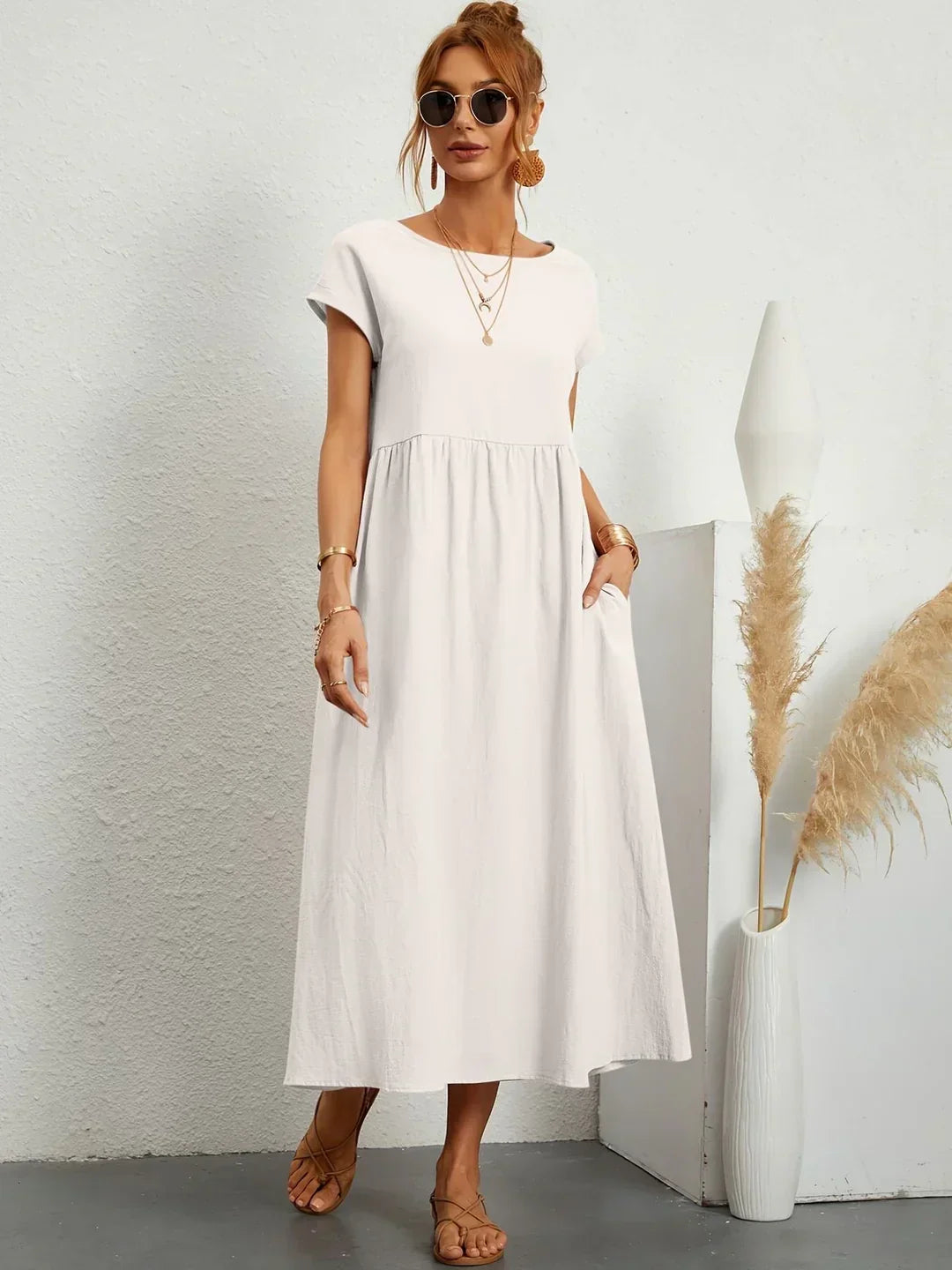 Abito midi fluido eleganza senza tempo