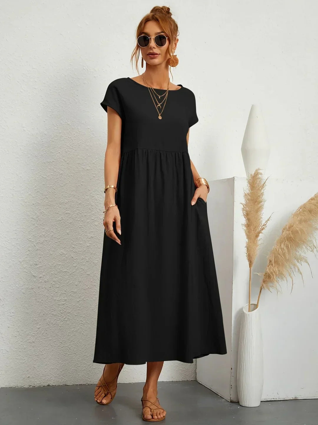 Abito midi fluido eleganza senza tempo