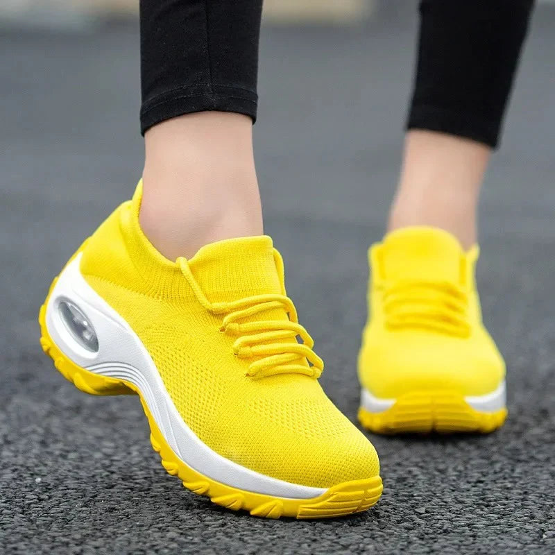 Scarpe da ginnastica con cuscino d'aria in rete per donne